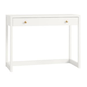 A white rectangular desk with a single large drawer and two gold knobs, featuring simple, straight legs.
