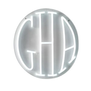 A circular white neon sign displaying the letters "CHA" against a plain white background.