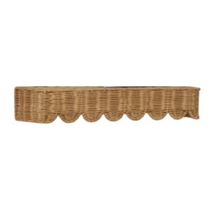 Rectangular wicker wall shelf with a scalloped edge design along the bottom.