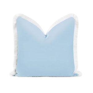Light blue square throw pillow with white fringe trim.