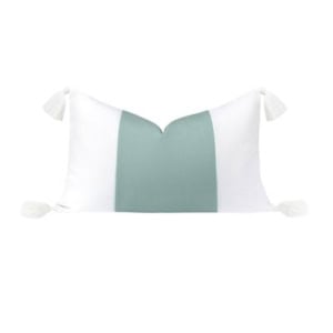 Rectangular lumbar pillow with a sage green center panel, white sides, and white corner tassels.